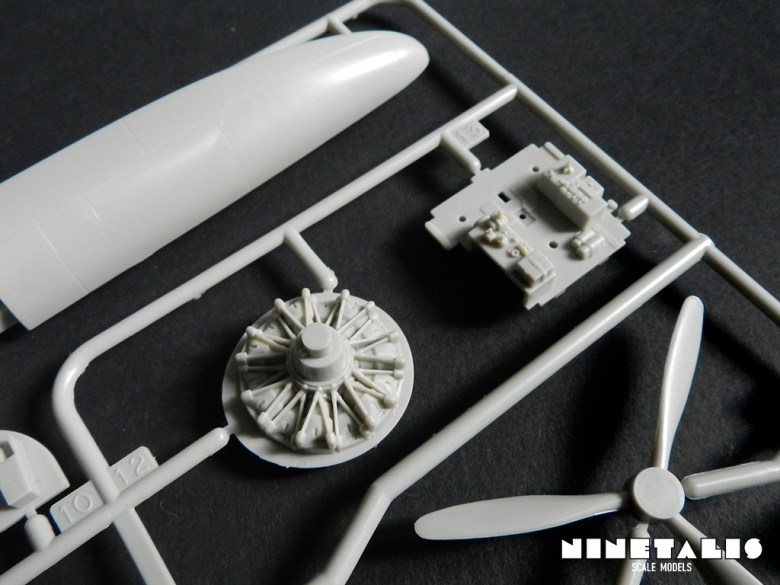 A detail shot of engine and a part of the canopy found on sprue A in Tamiya's kit number 61036 Kawanishi N1K1 Kyofu Type 11. floatN1K1-sprue2detail