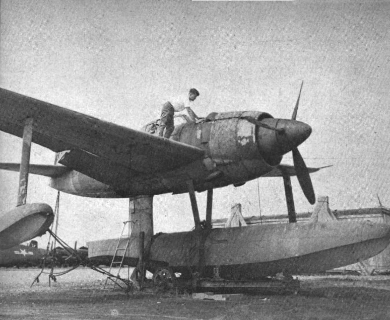 A captured Japanese Kawanishi N1K1 Kyofu is put to mothballs in 1949. Photograph is part of the Public Domain. Kawanishi_N1K1_at_NAS_Norfolk_in_1949