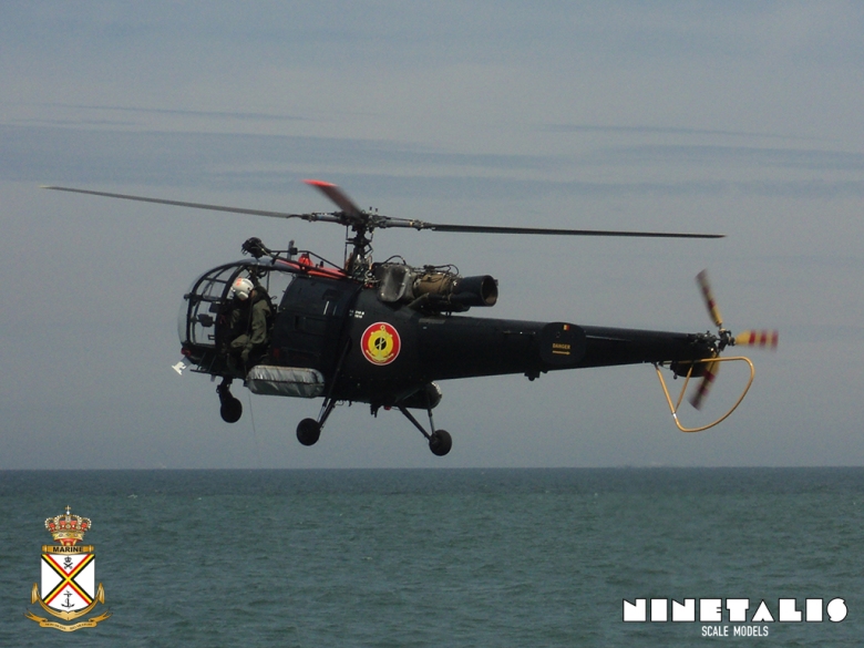 A Belgian Air Force Alouette III hovers near the Leopold I Frigate of the Belgian Navy during an exercise.