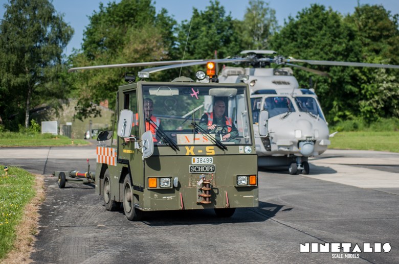A towing vehicle on it's way to move one of the aircraft on display during the THPU Spottersday in 2016. Eurocopter RN-01 can be seen in the background.